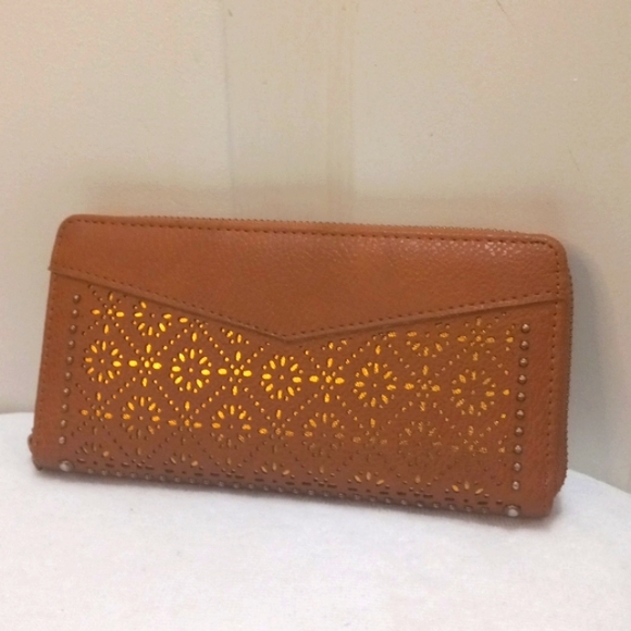 Tan Wallet with Elliptical Cutout W/Shimmering design behind - Picture 1 of 6